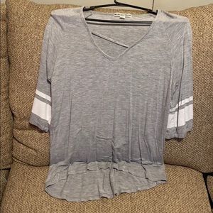 Long Sleeve Grey shirt w/ white stripes on sleeves